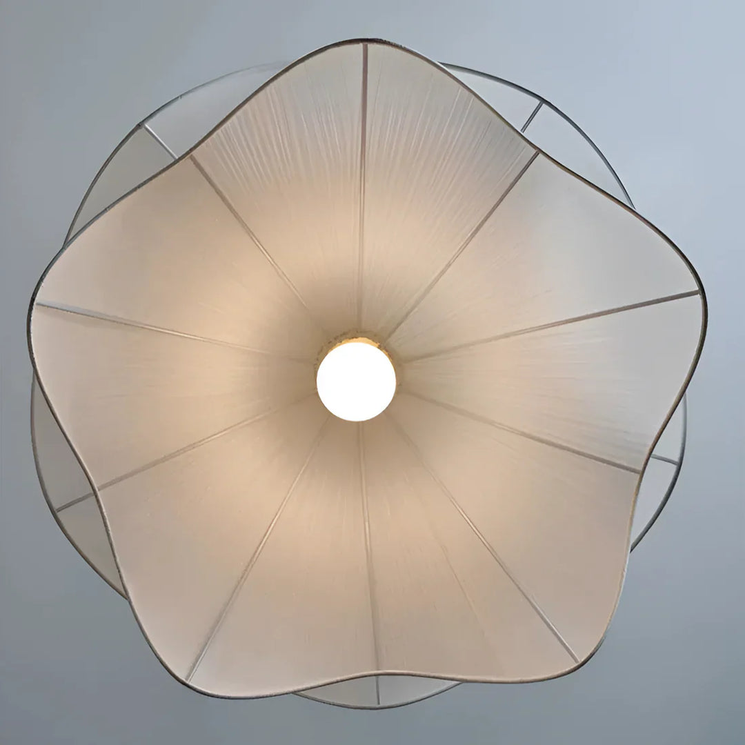 Modern white fabric flower LED pendant light with elegant design, soft glow, ideal for chic interiors, adjustable length.