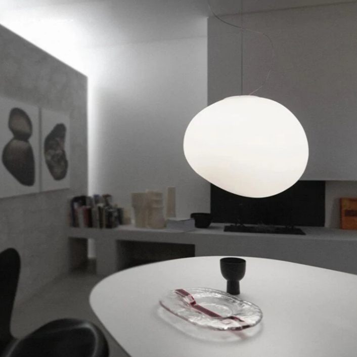 "Modern white glass globe pendant light, spherical design, elegant home decor, warm glow, perfect for living and dining areas