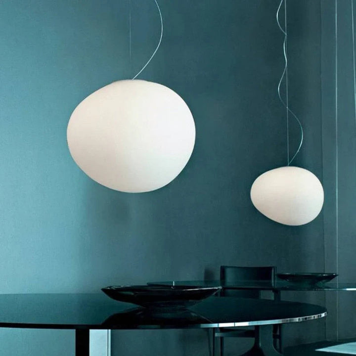 "Modern white glass globe pendant light, spherical design, elegant home decor, warm glow, perfect for living and dining areas