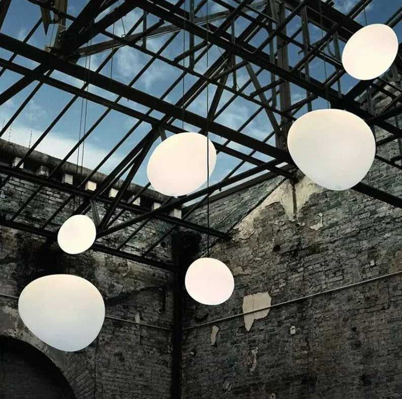 "Modern white glass globe pendant light, spherical design, elegant home decor, warm glow, perfect for living and dining areas