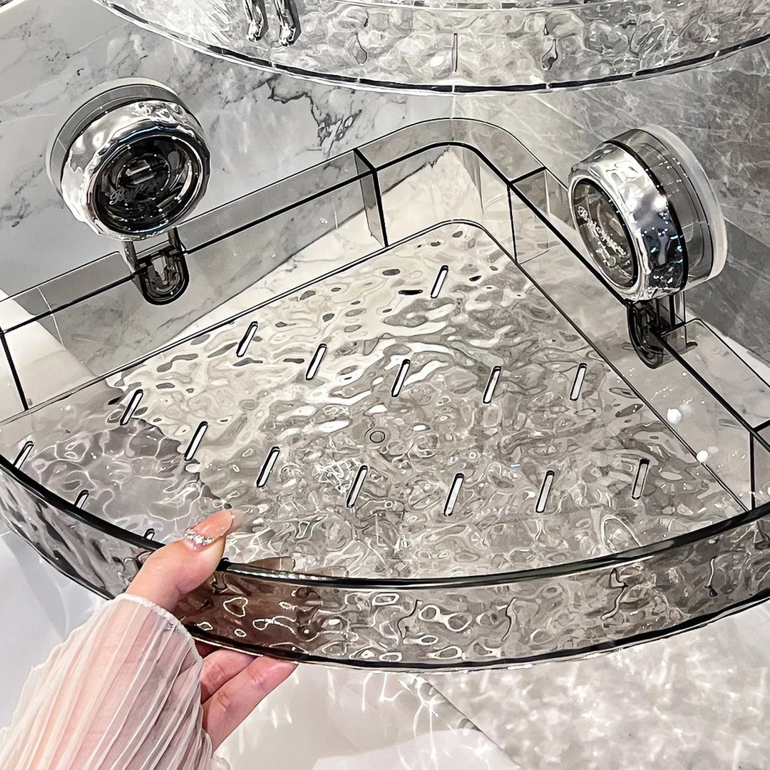 "No-drill wall storage with strong suction cups; transparent, holds heavy items securely, sleek design for bathroom use."
