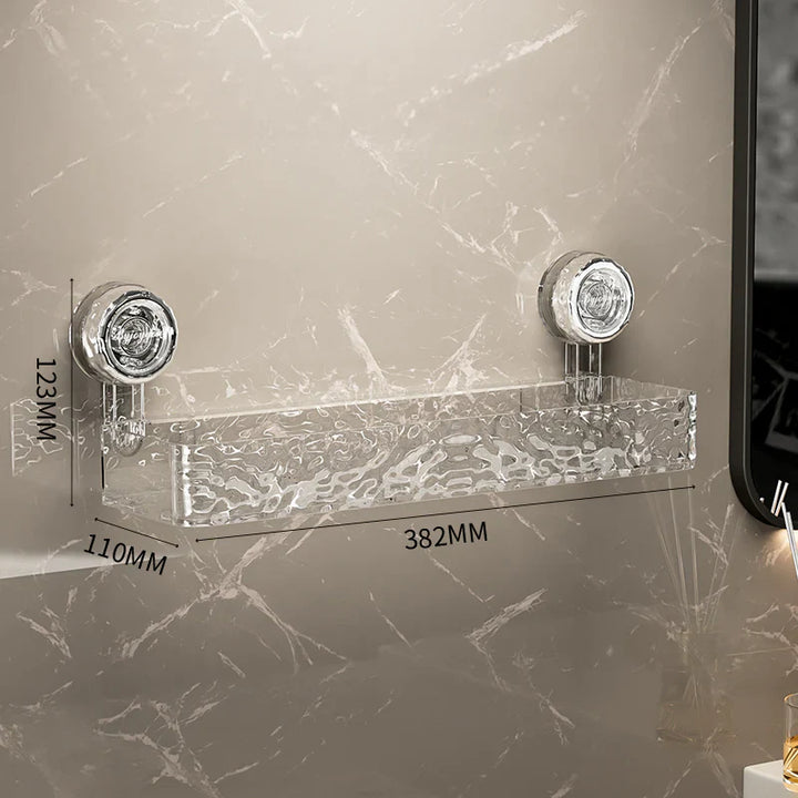 "No-drill wall storage with strong suction cups; transparent, holds heavy items securely, sleek design for bathroom use."