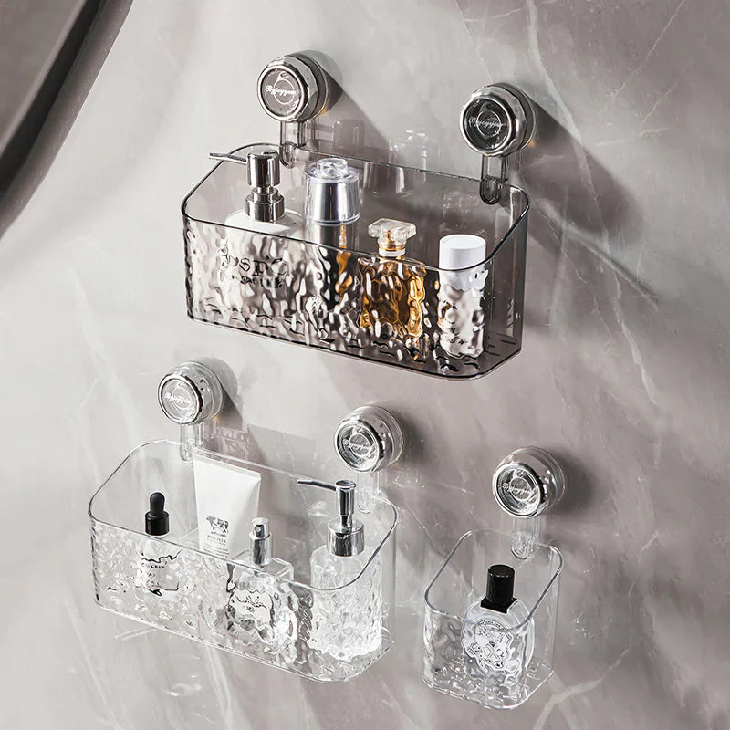 "No-drill wall storage with strong suction cups; transparent, holds heavy items securely, sleek design for bathroom use."