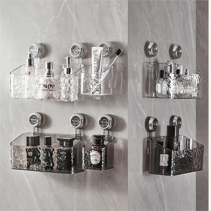 "No-drill wall storage with strong suction cups; transparent, holds heavy items securely, sleek design for bathroom use."