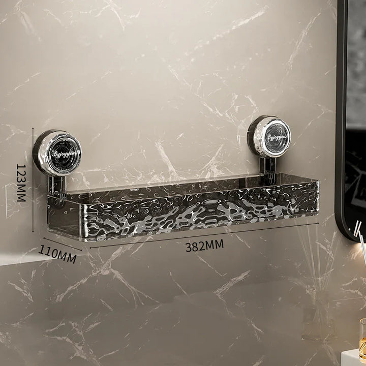 "No-drill wall storage with strong suction cups; transparent, holds heavy items securely, sleek design for bathroom use."