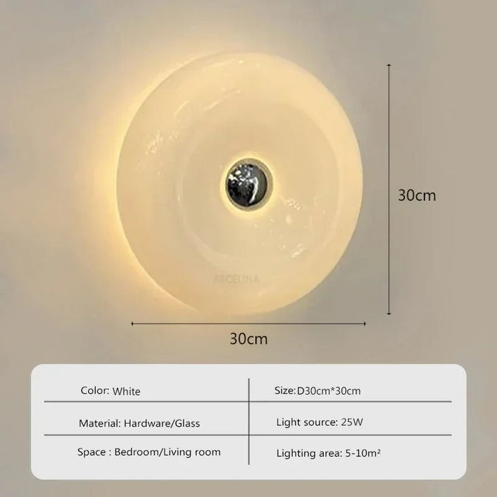 Orange donut-shaped LED lamp with warm glow, fits as a wall or table lamp, whimsical design with high-quality glass and metal