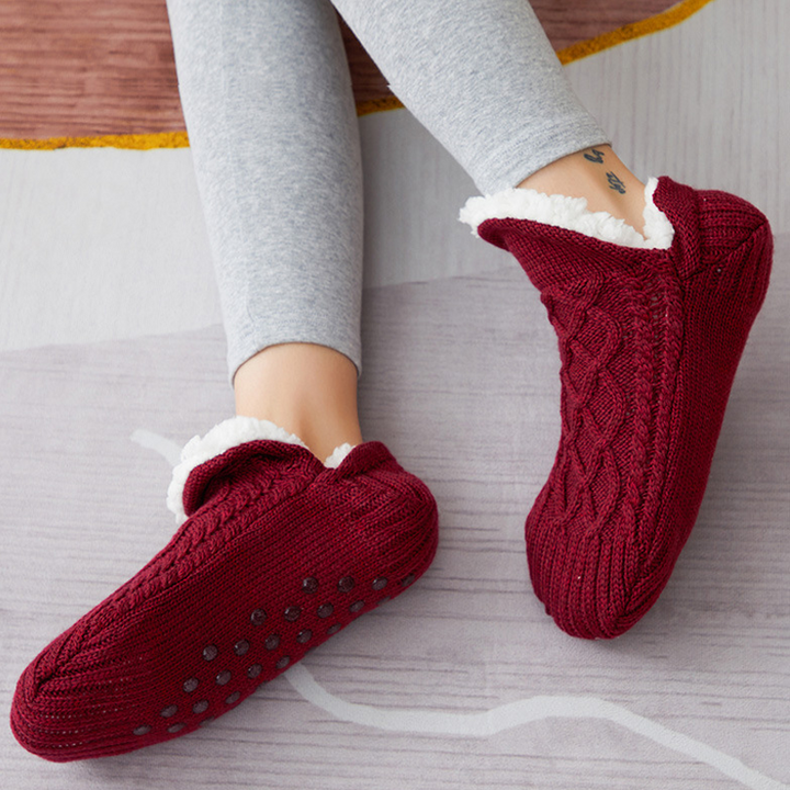 Detail of the plush interior of a warm grey unisex slipper sock, promising ultimate coziness and comfort.