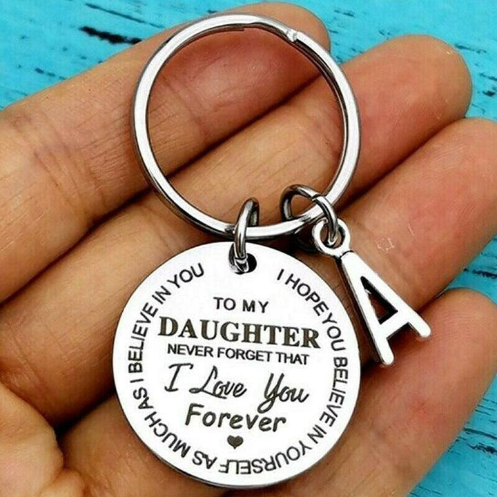 Close-up of a personalized initial letter keychain, an ideal family gift.