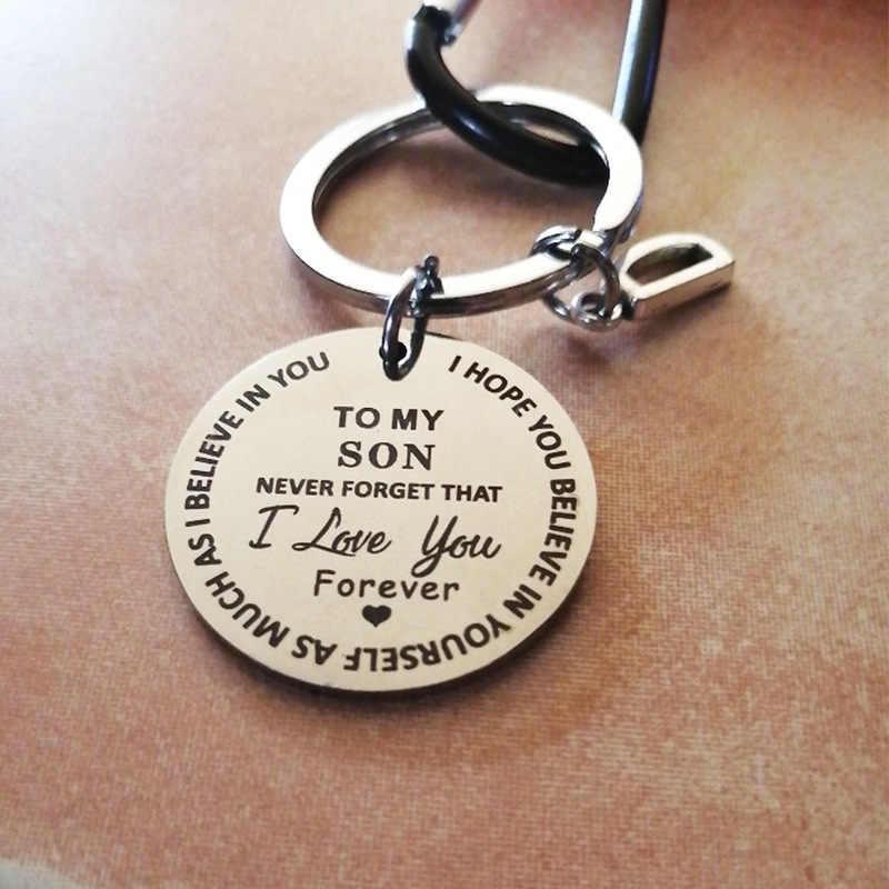 Close-up of a personalized initial 'J' keychain, made of stainless steel, ideal as a sentimental accessory gift.