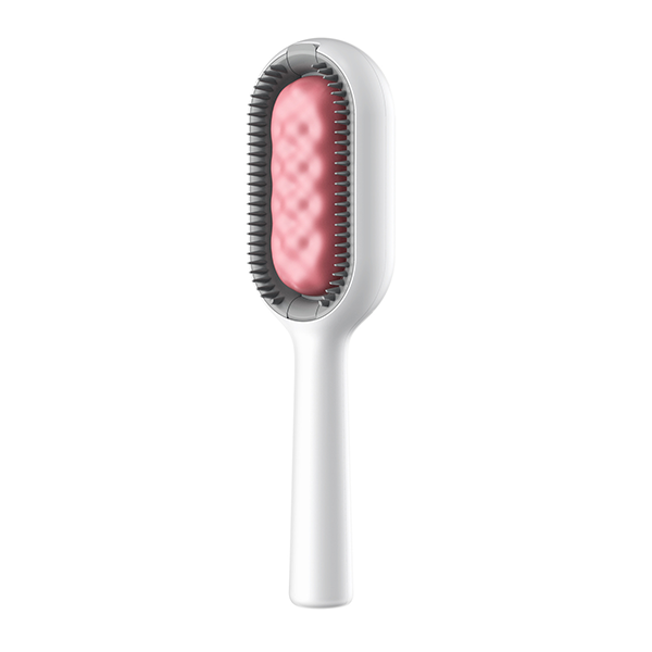 Deshedding tool with water spray, enhancing pet comfort during grooming sessions.