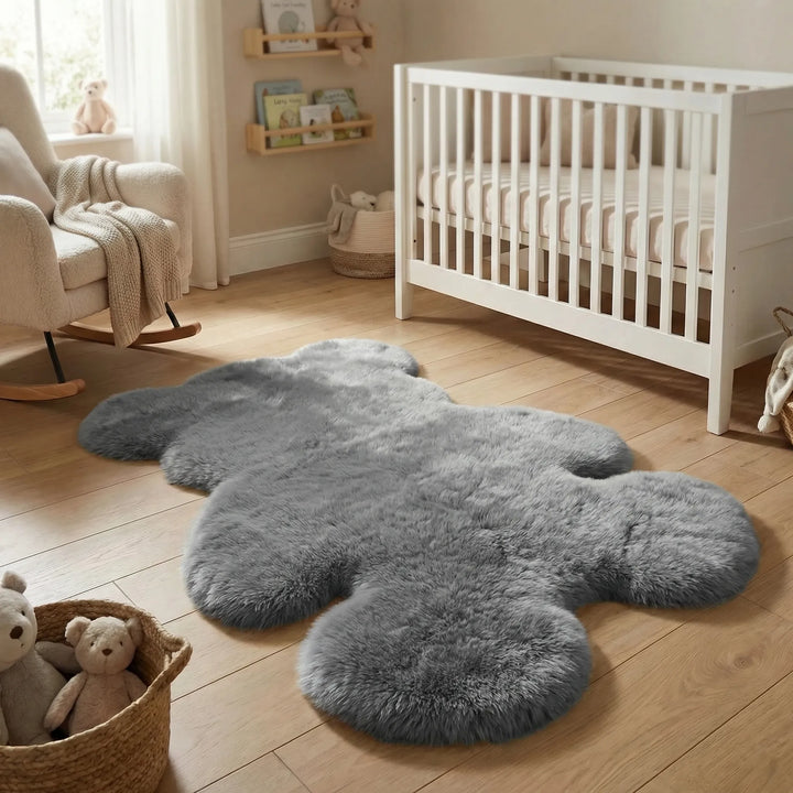 Flowique waves design on a plush gray bear-shaped kids' rug. Soft nursery play mat for child's room.