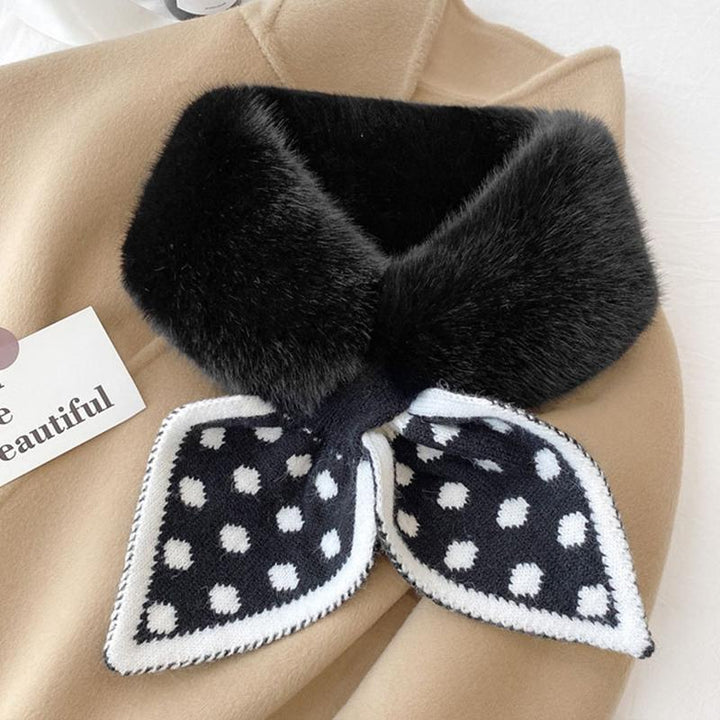 Detail shot of the secure stitching on a high-quality plush winter scarf.
