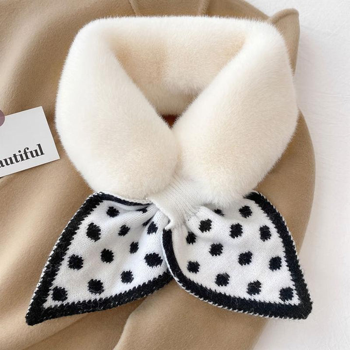 Winter fashion accessory: a women's plush scarf in a rich, deep color.