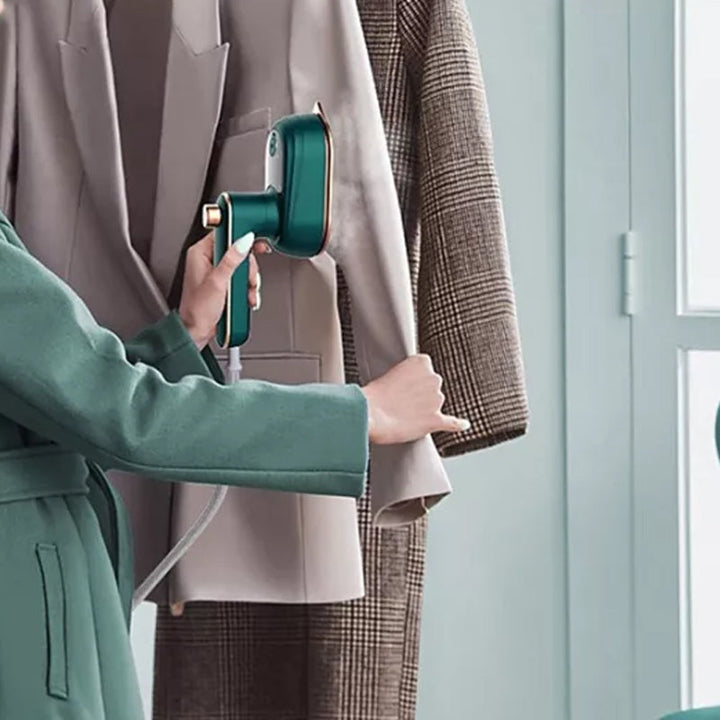 Portable garment steamer, ergonomic design for comfortable and effective use