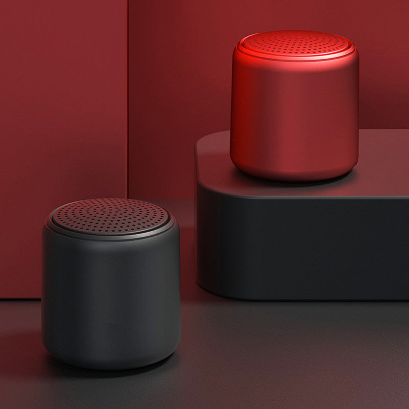 Black wireless speaker, mini size, waterproof, perfect for beach or shower