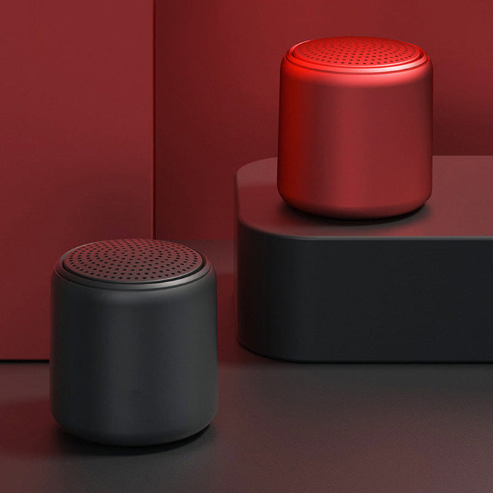 Black wireless speaker, mini size, waterproof, perfect for beach or shower
