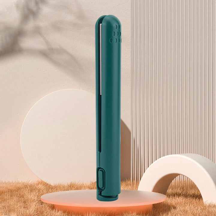 Curling a section of hair with the versatile USB-powered mini hair tool, creating soft waves.