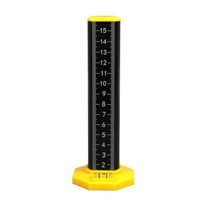 Detail shot of the magnetic base on a level tool, showing its strong hold on metal surfaces.
