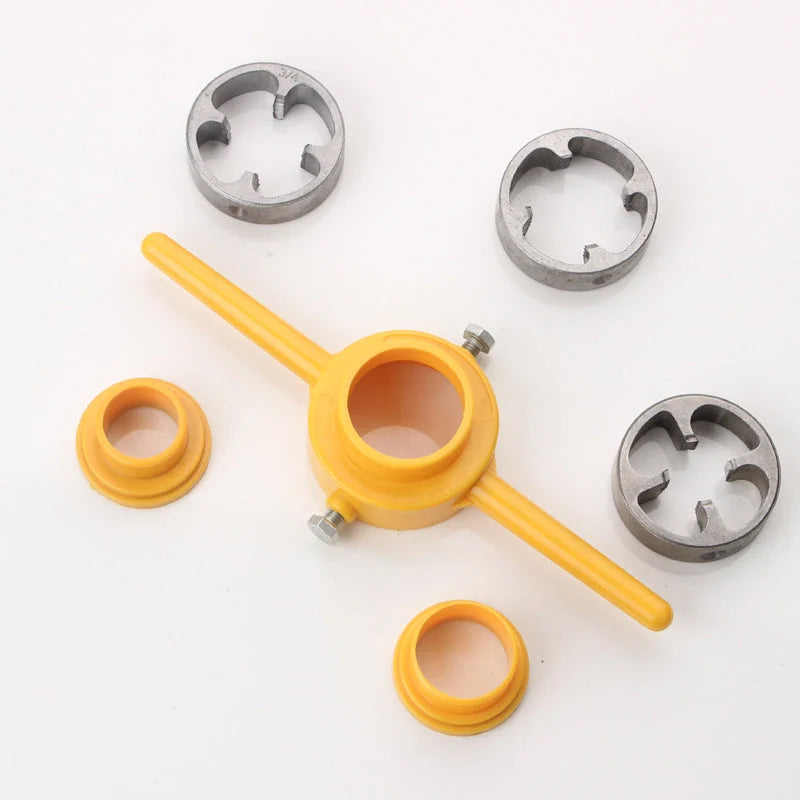Various components of a universal PVC pipe threading kit, laid out for inspection