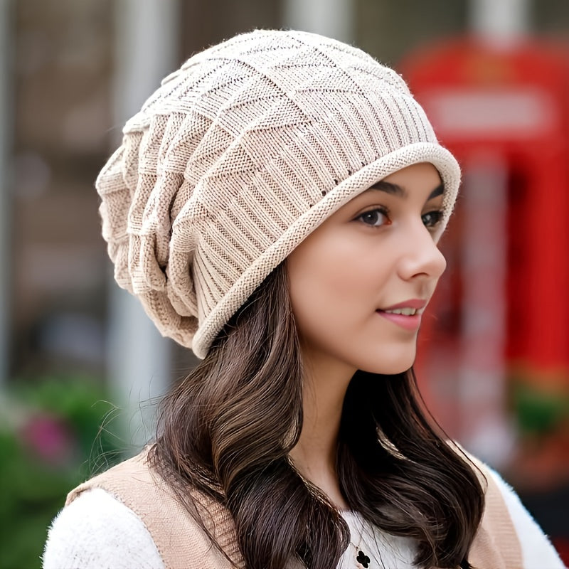 Versatile women's lightweight knitted beanie, perfect spring/fall travel accessory.