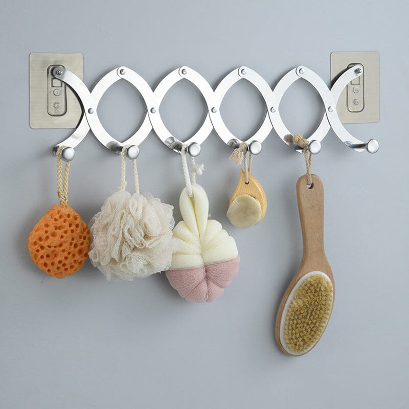 Stainless steel retractable door hanger with multiple hooks, ideal for entryway coat storage