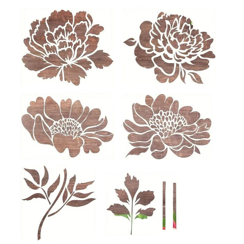 A living room wall with a partially stenciled floral design using the reusable kit, homedecor