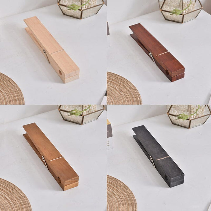 Rustic wooden clothespin towel holder, wall mounted, perfect for bathroom decor and organization.