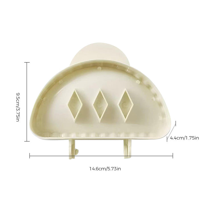 Close-up of a mini hand pie mold's intricate pattern, designed to create a beautiful scalloped edge on pastries