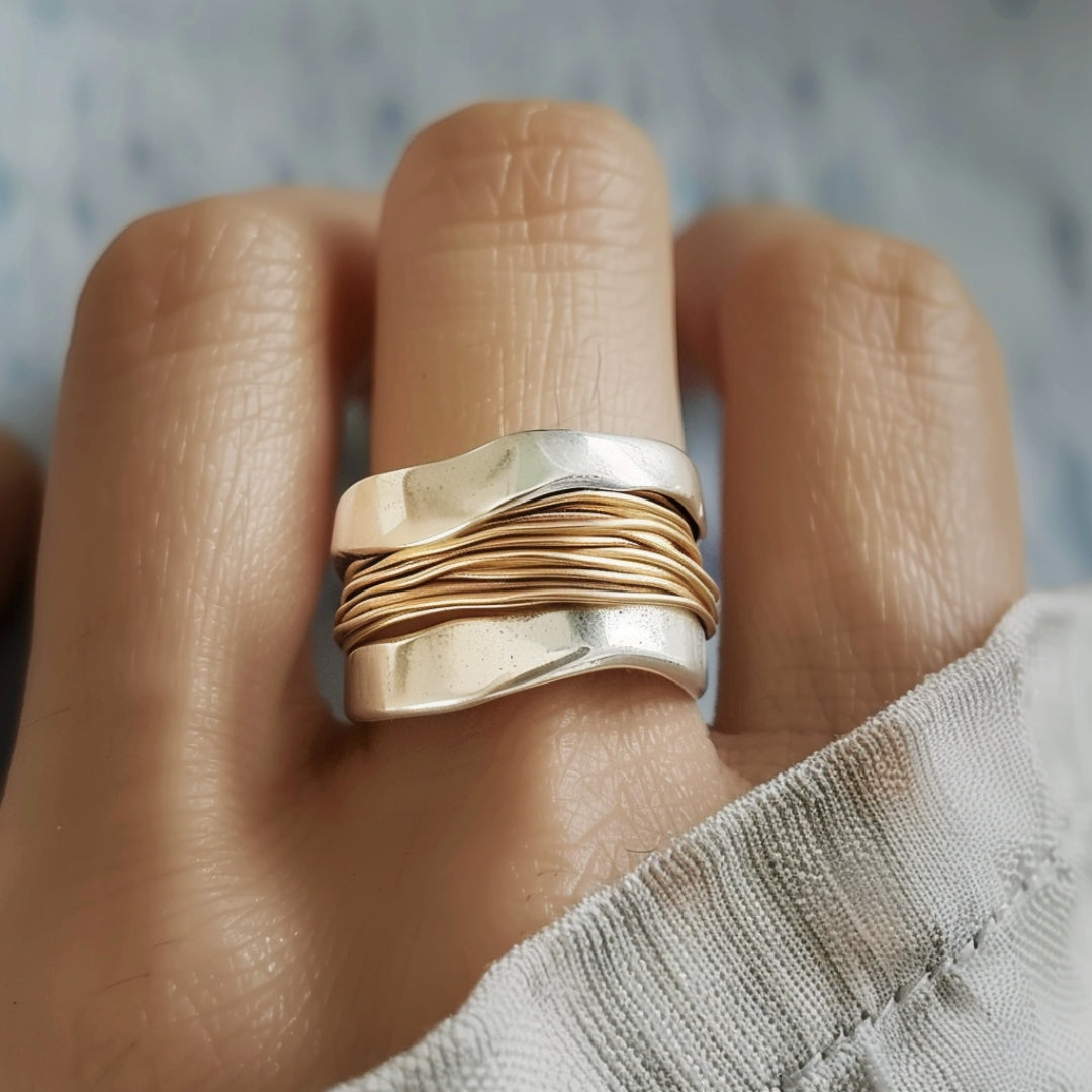 Shimmering silver & gold thread ring for women. Elegant, versatile everyday stacking jewelry accessory.
