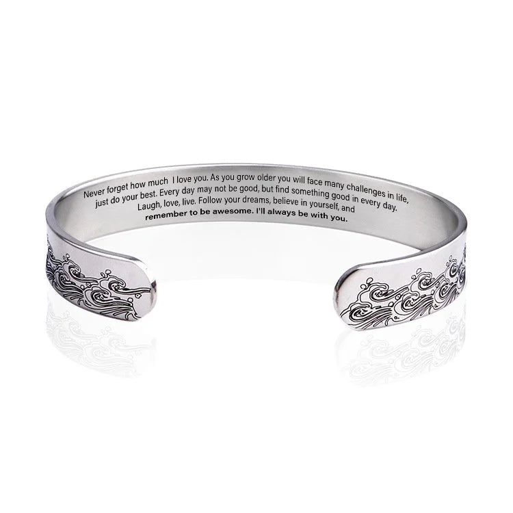 Granddaughter stainless steel cuff bracelet displayed on a gift box, ready for presentation