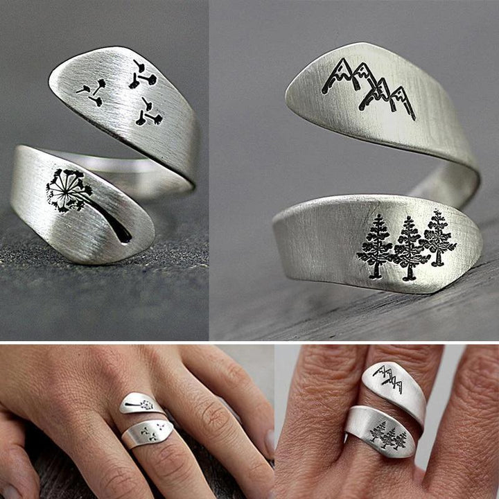 Silver adjustable ring with dandelion art, perfect for nature-inspired fashion jewelry