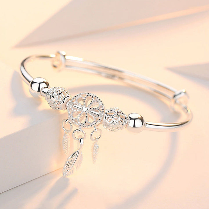Adjustable silver dreamcatcher bracelet, women's accessory, delicate charm design, special gift