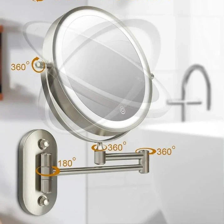 Silver rechargeable LED vanity mirror with adjustable lighting, 360° rotation, and various magnification options for precise 