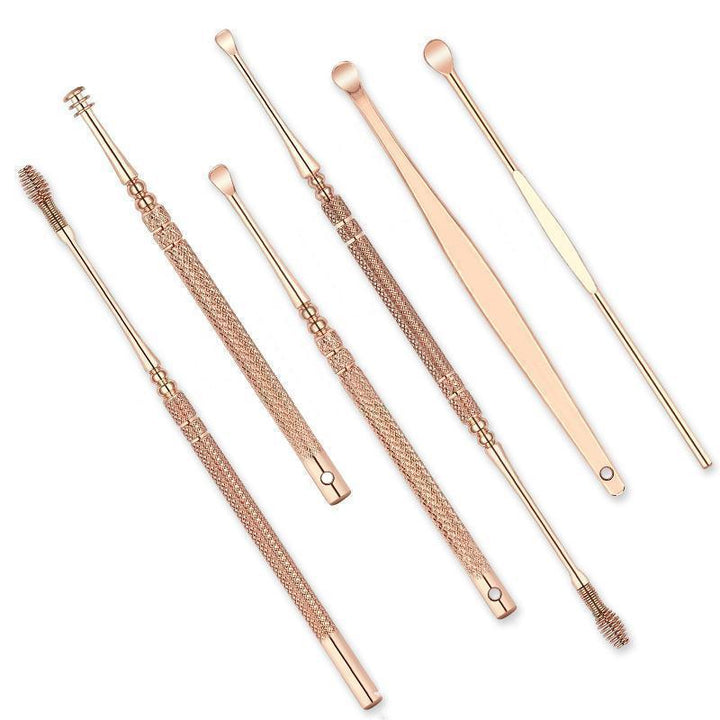 Rose gold earwax removal kit with various stainless steel curettes for precise ear cleaning.