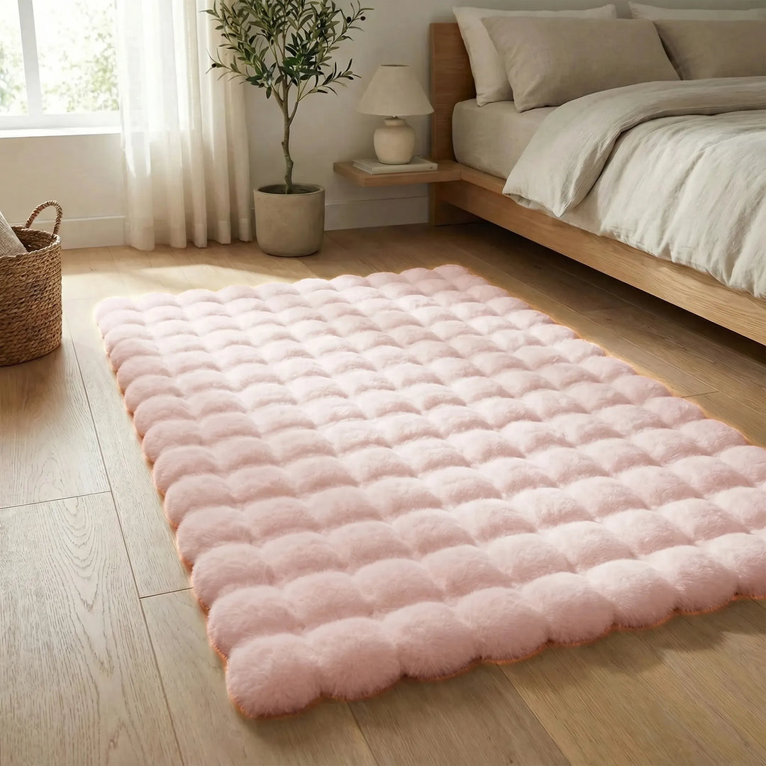 Soft textured area rug, plush and cozy with a subtle wave pattern, perfect for warm home decor.