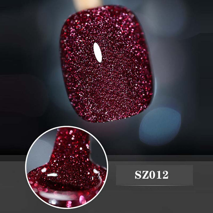 Close-up of a sparkling glitter gel nail polish brush, ready for a shimmering application