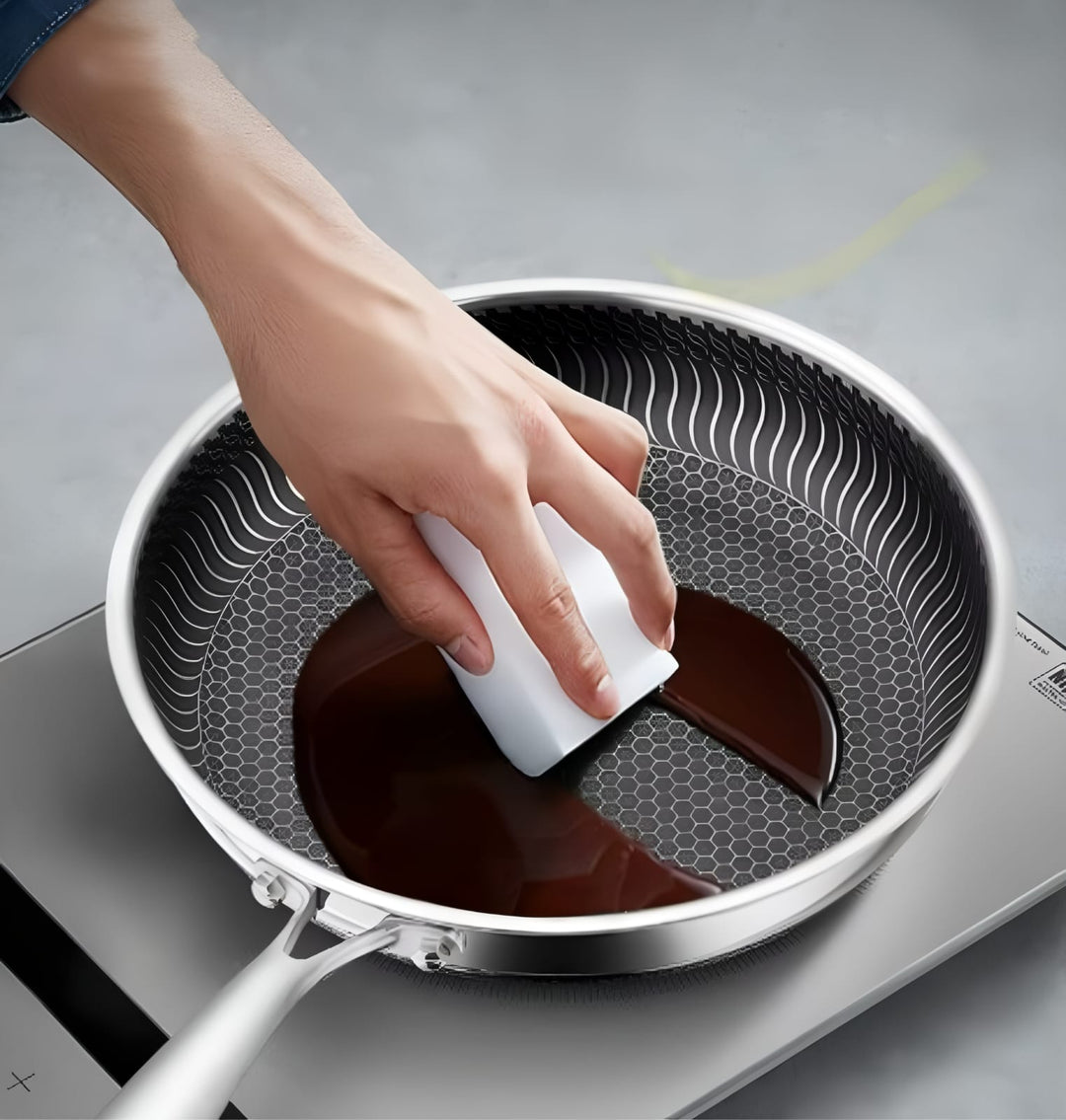 "Stainless steel honeycomb non-stick wok with ergonomic handle, showcasing durable surface and sleek stir-fry design."