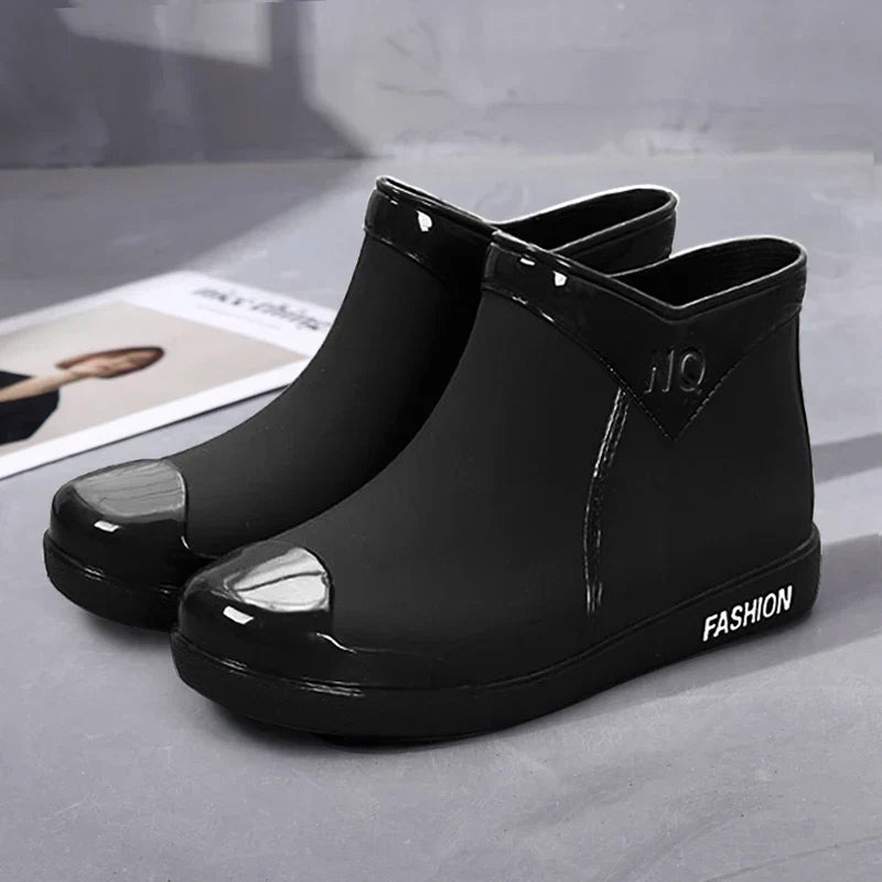 Stylish women's waterproof ankle boots with side zip. Perfect for autumn fashion and staying dry in the rain.