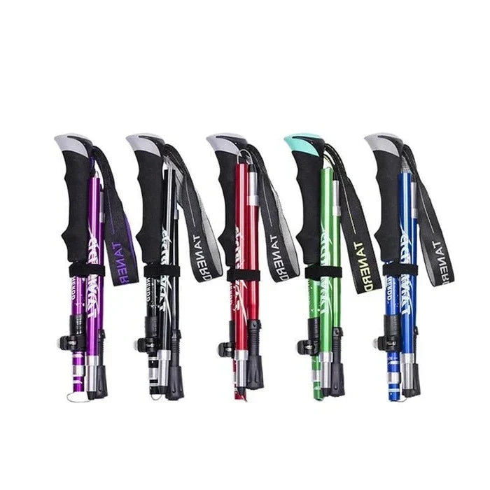 Two unisex folding trekking poles in a natural setting. Perfect lightweight hiking sticks for all terrains.