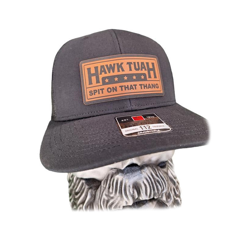 Detail of the adjustable buckle on a grey cotton dad hat, ensuring a secure and custom fit