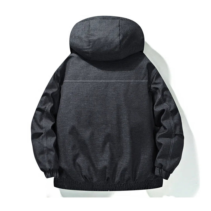 Folded unisex fleece-lined hooded jacket, ready for travel, emphasizing its warmth and compact nature.