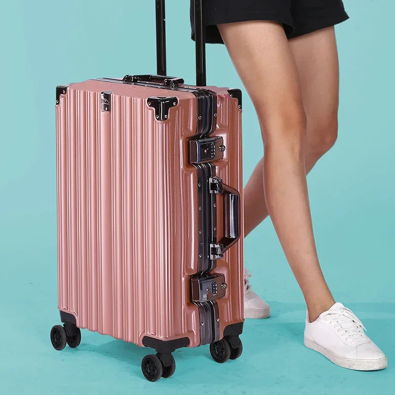 Large black hardshell checked luggage, durable aluminum frame, perfect for secure, long-distance unisex travel.