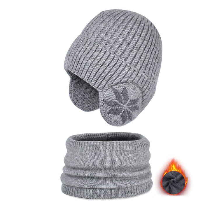 Detailed view of the knit pattern on a purple winter beanie and scarf set, fleece lined
