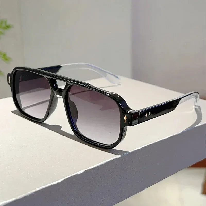Modern unisex rectangular UV400 sunglasses, offering excellent glare reduction
