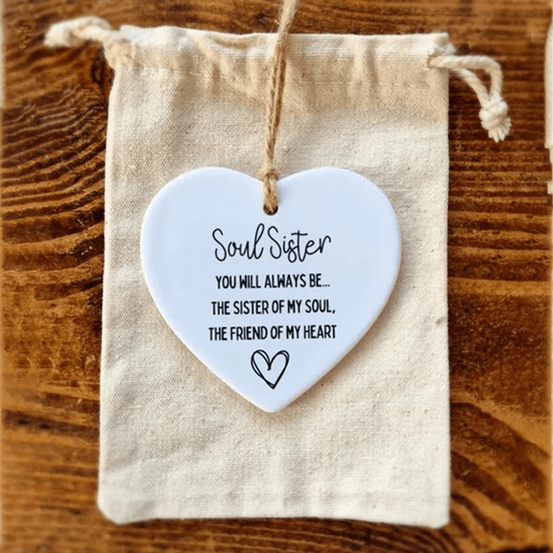 Keepsake heart crafted from ceramic, conveying a message of gratitude or comfort; a beautiful quote decor item.