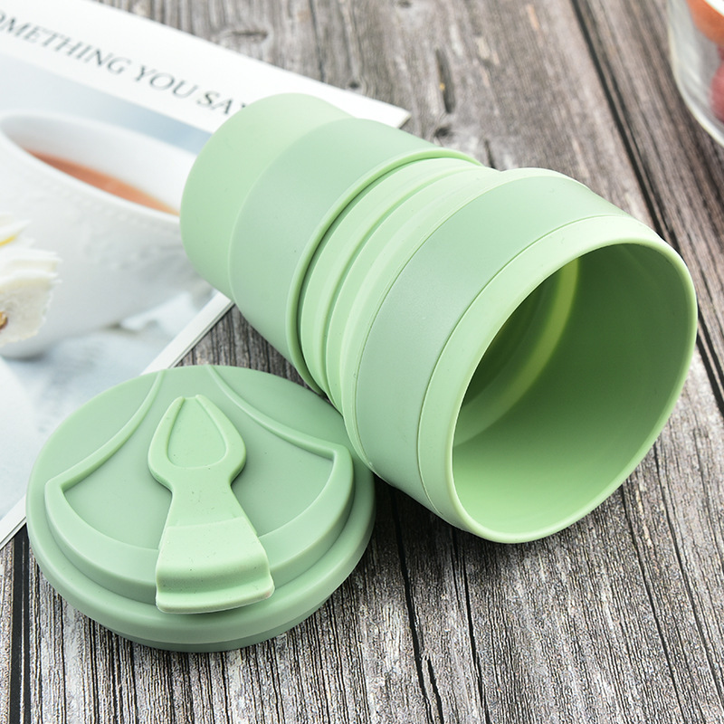 Yellow eco-friendly collapsible water bottle, soft silicone, durable drinkware for all ages