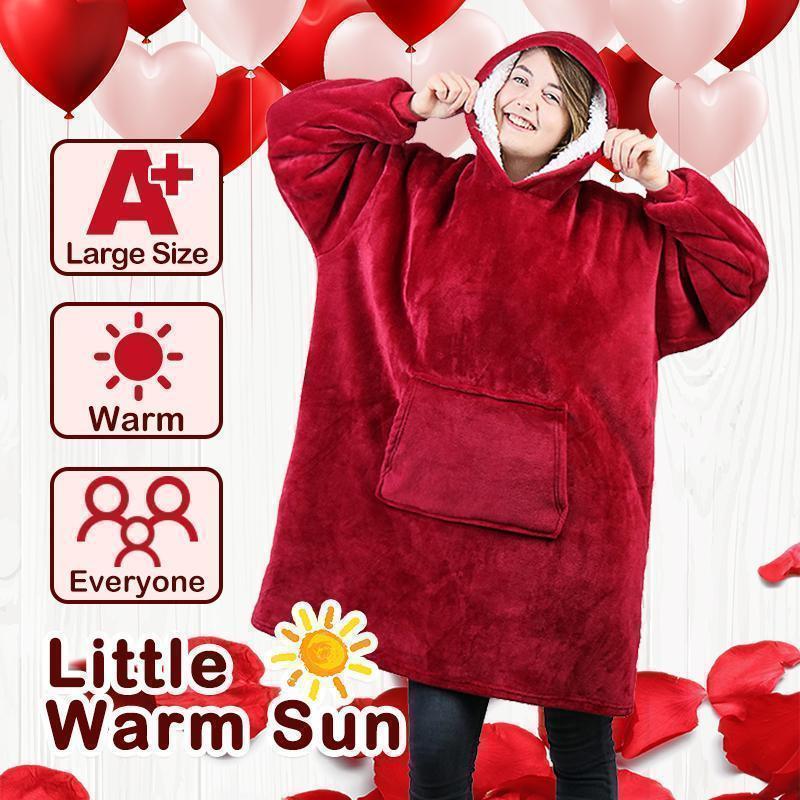 Unisex cozy oversized blanket sweatshirt in a warm, plush material, perfect for winter lounge wear.
