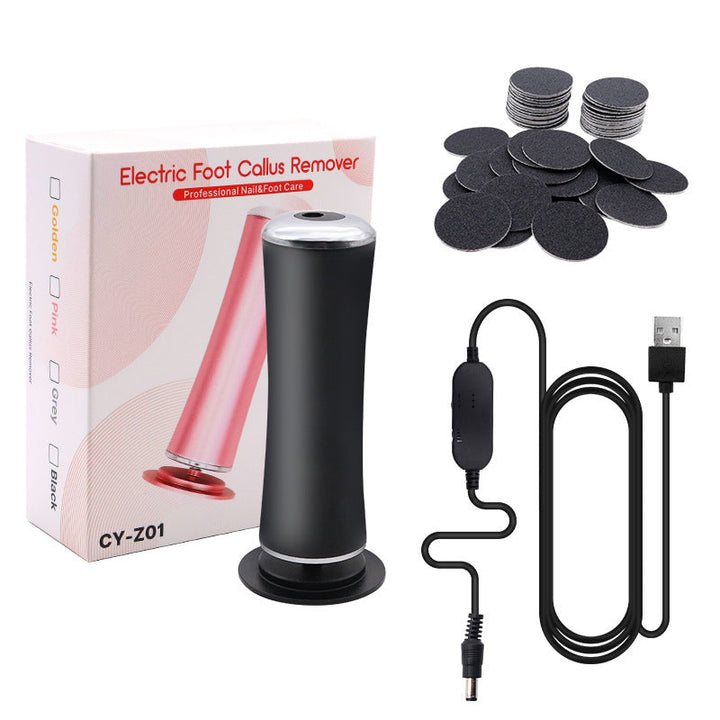 Unisex electric foot callus remover next to a bottle of foot cream, part of a complete foot care routine