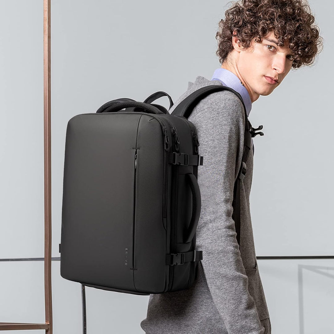 Detail of padded shoulder straps & breathable back panel of expandable backpack.