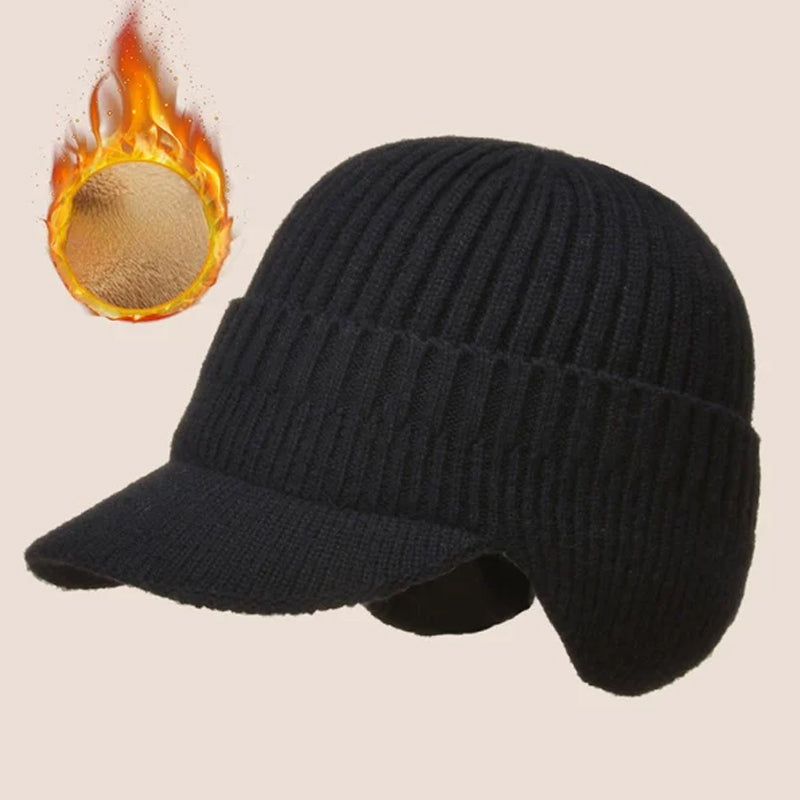 Product photo of a red knit beanie, highlighting its ear protective design for winter.